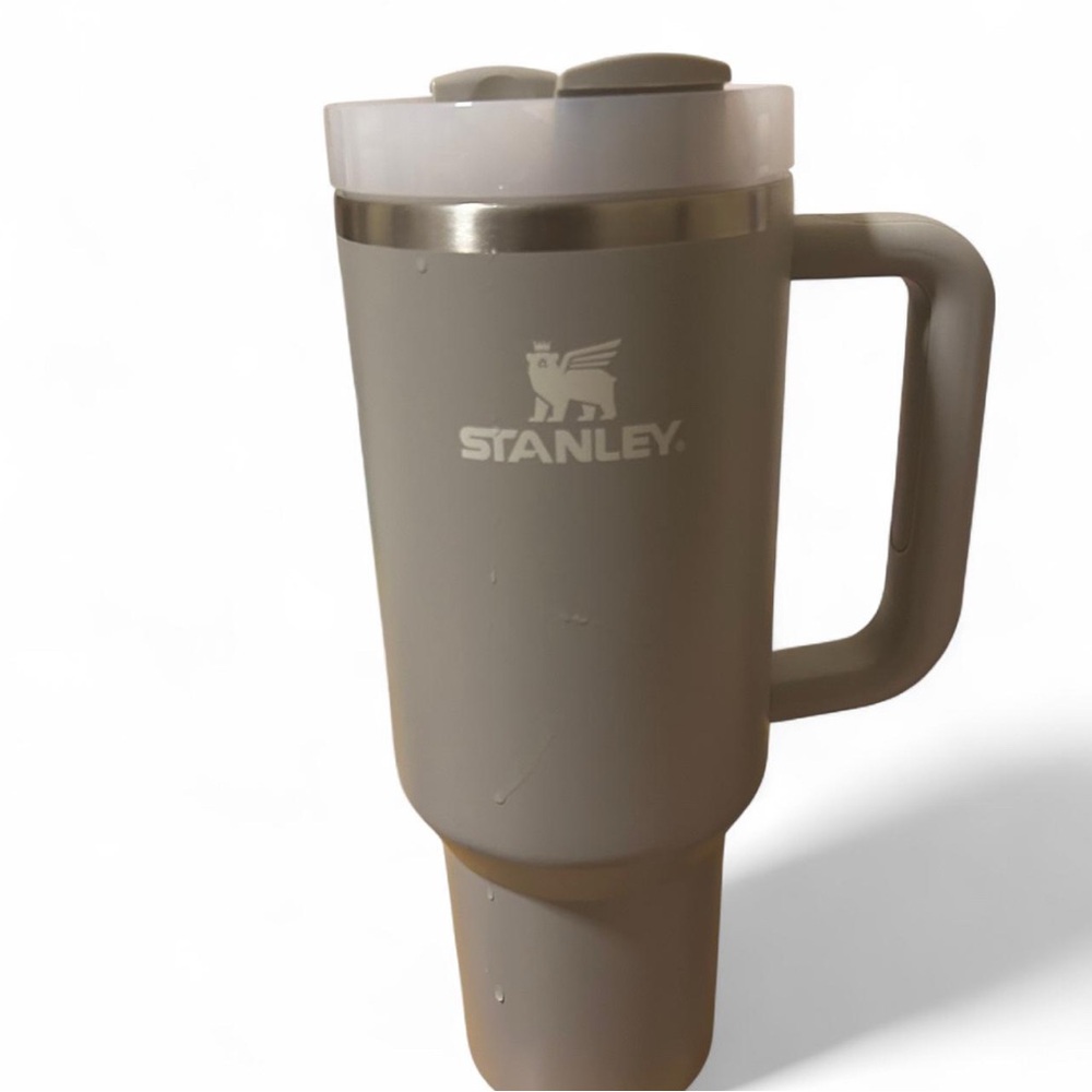 Grey and white Stanley 40 oz travel mug.